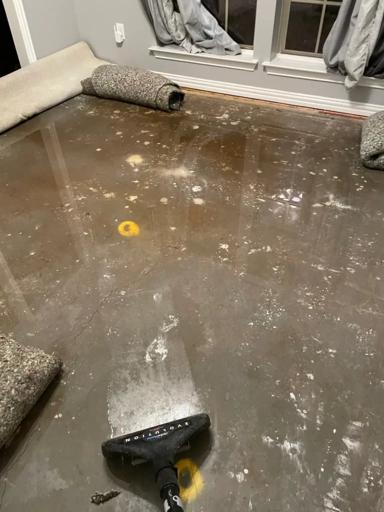 Flooded basement with standing water being removed using professional extraction equipment in Northeast Ohio