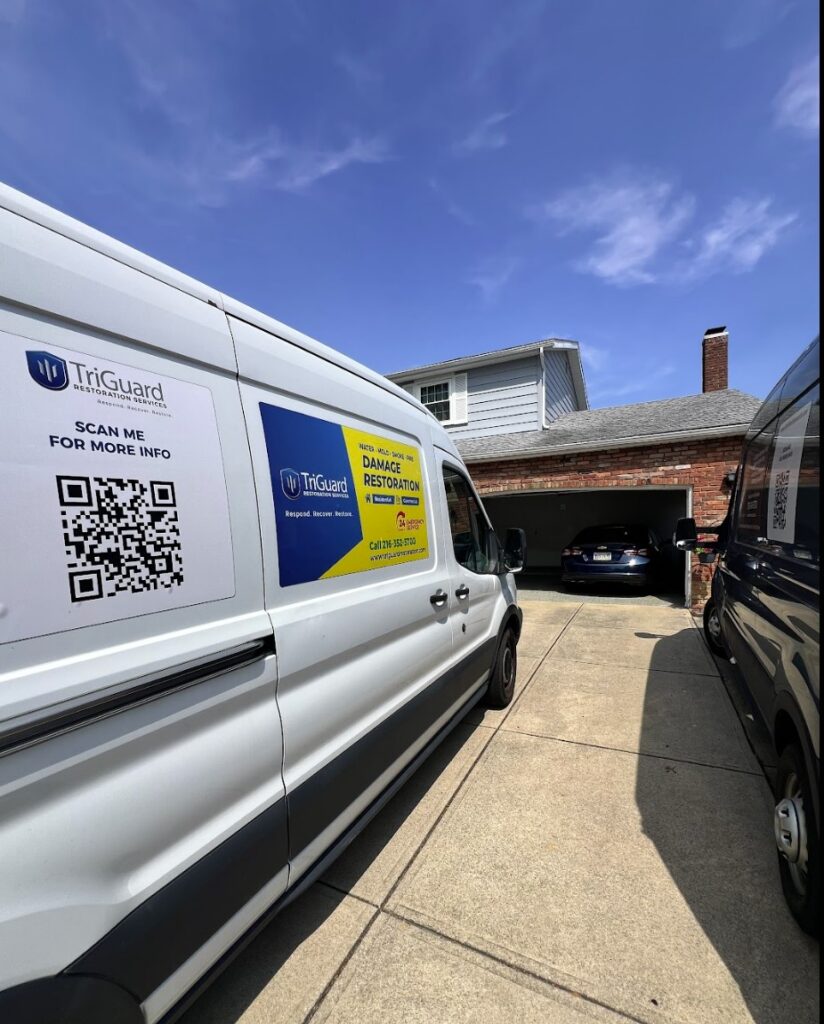 TriGuard Restoration service van responding to a residential water damage project.